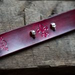 Red fleur-de-Lis bracelet with little skulls
